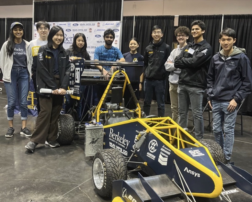 Berkeley Formula Racing team members standing behind the team car
